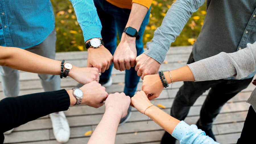 team work , hands , holding hands together, team hands, smartwatch, community, friends, teamwork